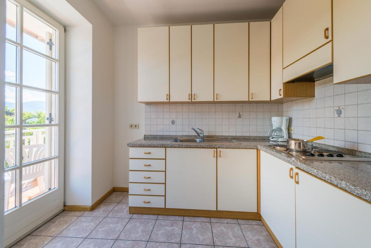 Ferienwohnungen Sonnenburg Caldaro Esterno foto